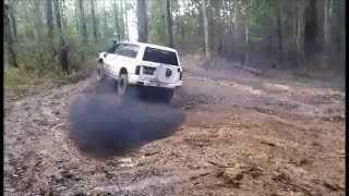 Nissan Patrol GU rd28 28 turbo diesel and with turbo diesel hilux playing in the mud [upl. by Garey398]