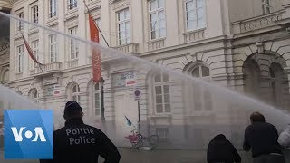 Police Use Water Cannon During Climate Protest in Brussels [upl. by Colton]