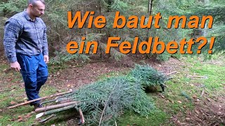 Wie baut man ein Feldbett Bushcraft [upl. by Larred]