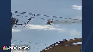 Video shows helicopter on fire prior to Florida crash [upl. by Toshiko343]