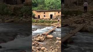 in the village women wash vegetables and clothes in the river travel shorts [upl. by Lorianna]