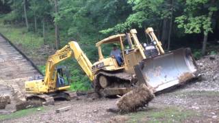 Steep slippery slope for a dozer and excavator [upl. by Ecnerwaled]