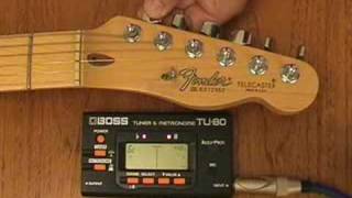 How to use an electronic guitar tuner to tune your guitar [upl. by Okwu863]