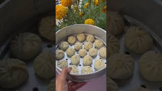 Savouring the flavour of buff momo viralvideo shorts cooking [upl. by Anneirb]