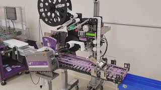 MFT Friction Feeder and IMPRESSO Labeler System  Feeding and Labeling Plastic Bags [upl. by Leta]