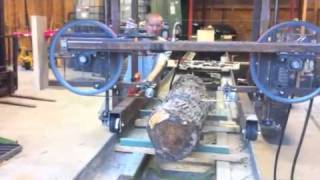 First cut Homemade hydraulic bandsaw mill [upl. by Nosnej211]