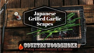 Japanese BBQ Konro cooked garlic scapes [upl. by Anilasor730]