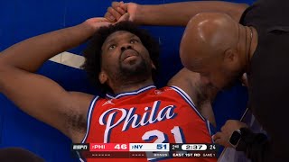 Joel Embiid insane self oop off glass for poster dunk but hurts his knee again 😬 [upl. by Rafaelita]