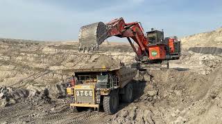 Hitachi Ex 2500 excavator Loading caterpillar Truck [upl. by Yenaiv858]