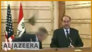 President Bush caught in shoe attack in Iraq  Al Jazeera English [upl. by Asante68]