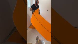 Preparing the Floor for Tile Installation with Ditra Underlayment [upl. by Aerdua]