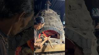 Traditional pizza oven baked in wood fire brick oven [upl. by Naima]