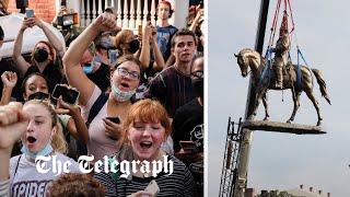 Virginia removes huge Confederate statue of Robert E Lee to cheers and applause [upl. by Kazue]