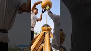 Installation process of gourdshaped decorative parts on the pavilion roof [upl. by Ennoitna]