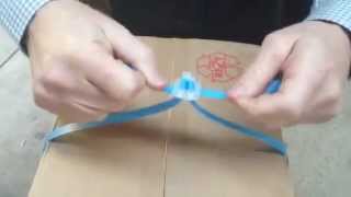 How to use Polystrapping with a plastic buckle by hand [upl. by Elatnahs]