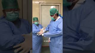 How to use disposible sterile gown and surgical gloves in the operating room surgicaleducation [upl. by Winshell]