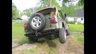 91 Jeep Wrangler YJ bone stock suspension flexarticulation [upl. by Tsepmet]