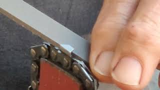 Square filing chainsaw chain [upl. by Ellehsram]