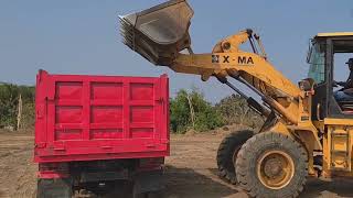 Wheel Loaders And Dump Trucks Work Dredging Loading Rocks [upl. by Steffin497]