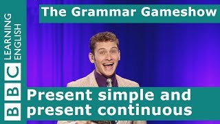 Present Simple and Present Continuous The Grammar Gameshow Episode 1 [upl. by Ellessig]