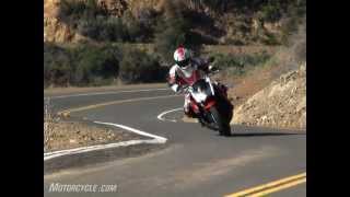 2010 Streetfighter Shootout Kawasaki Z1000 vs Triumph Speed Triple [upl. by Gabbie917]