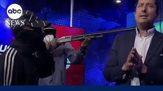 Armed men take over TV station in Ecuador [upl. by Yllod26]