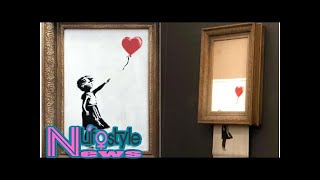 Banksy artwork shreds itself during auction after £104 million sale [upl. by Orbadiah]