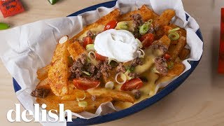 Taco Bell Nacho Fries BellGrande  Delish [upl. by Tybalt]