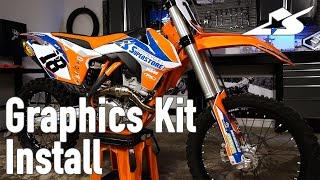 How to Install a Graphics Kit on a Motocross Bike [upl. by Amhser]