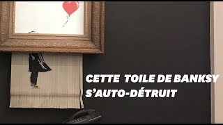 Ce tableau de Banksy s’autodétruit en pleine vente aux enchères [upl. by Lambertson]