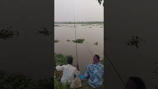 Two people are fishing together with a spear fish villagelife fitness shorts [upl. by Azenav588]