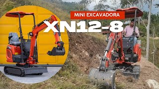 Mini excavadora XN128 Rhinoceros haciendo un camino [upl. by Adnyl657]