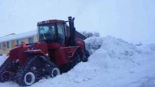 pushing snow case ih steiger stx535 quadtrac leon 4000 6 way blade [upl. by Paddy]