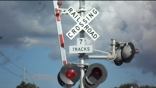 CSX Train Goes Through Railroad Crossing With 7 Tracks [upl. by Annadroj]