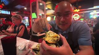 Chargrilled Oysters and raw oysters at Acme Oyster House in New Orleans [upl. by Gnot]