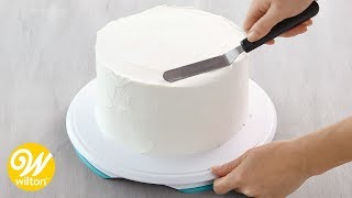 How to Crumb Coat and Ice a Cake Using a Spatula  Wilton [upl. by Ogdon]