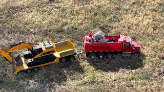 Rc 4ever Diecast Masters 49 Western Star Dump Truck pulling heavy loads in rough terrain [upl. by Akeinahs]