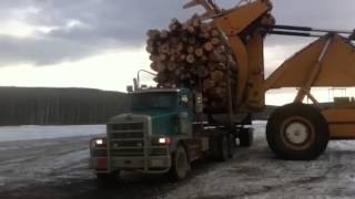 Wagoner unloading log truck [upl. by Dine]