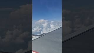 Breathtaking Aerial Views Snowy Clouds and Clear Blue Skies TravelShorts shorts youtubeshorts [upl. by Aissyla]