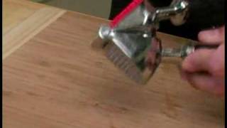 Cooking Tips  How to Use a Garlic Press [upl. by Anwahsiek633]