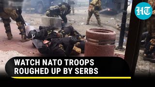 USled NATO troops chased beaten with sticks by Serbs in Kosovo  Dramatic Footage Goes Viral [upl. by Ayote]