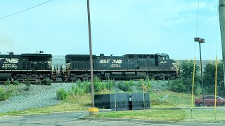 NS Eastbound pulls beside and passes Northbound CSX autorack with midtrain DPU [upl. by Kristine]