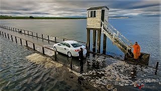 DRONE FILMS UBER TAXI PARTING THE SEA AND GETS STUCK ON HOLY ISLAND CAUSEWAY [upl. by Merlin]