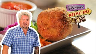 Guy Fieri Eats Luigis Arancini  Diners DriveIns and Dives  Food Network [upl. by Elena]