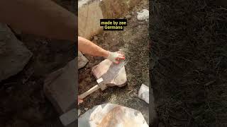 Cutting sandstone with 575 stonemason hammer stonewalling gardendesign canberra stonemasonry [upl. by Minnnie]