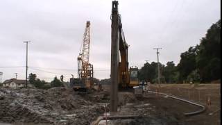 Excavating a Soil Bentonite Slurry Trench Cutoff Barrier Wall [upl. by Higbee129]