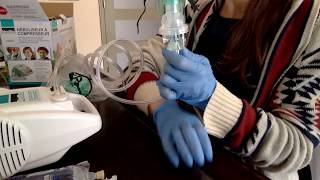 How to use a nebulizer including saline solution from an IV bag [upl. by Atimed]