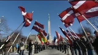 Latvia Waffen SS veterans commemorative march in Riga [upl. by Ojadnama806]