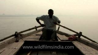 Gazing across at the spiritual city of Varanasi while being rowed along the Ganges [upl. by Devonna]