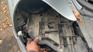 Porsche Cayenne 955 headlight mount replacement 5 minute job loose headlight repair [upl. by Ridley]